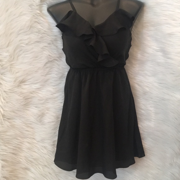 BCBGeneration Dresses & Skirts - BCBGeneration black strappy dress with pockets